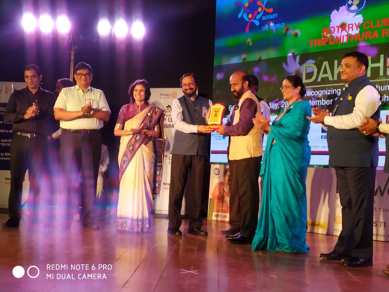 Receiving-the-Humanitarian-Service-Award-from-Rotary